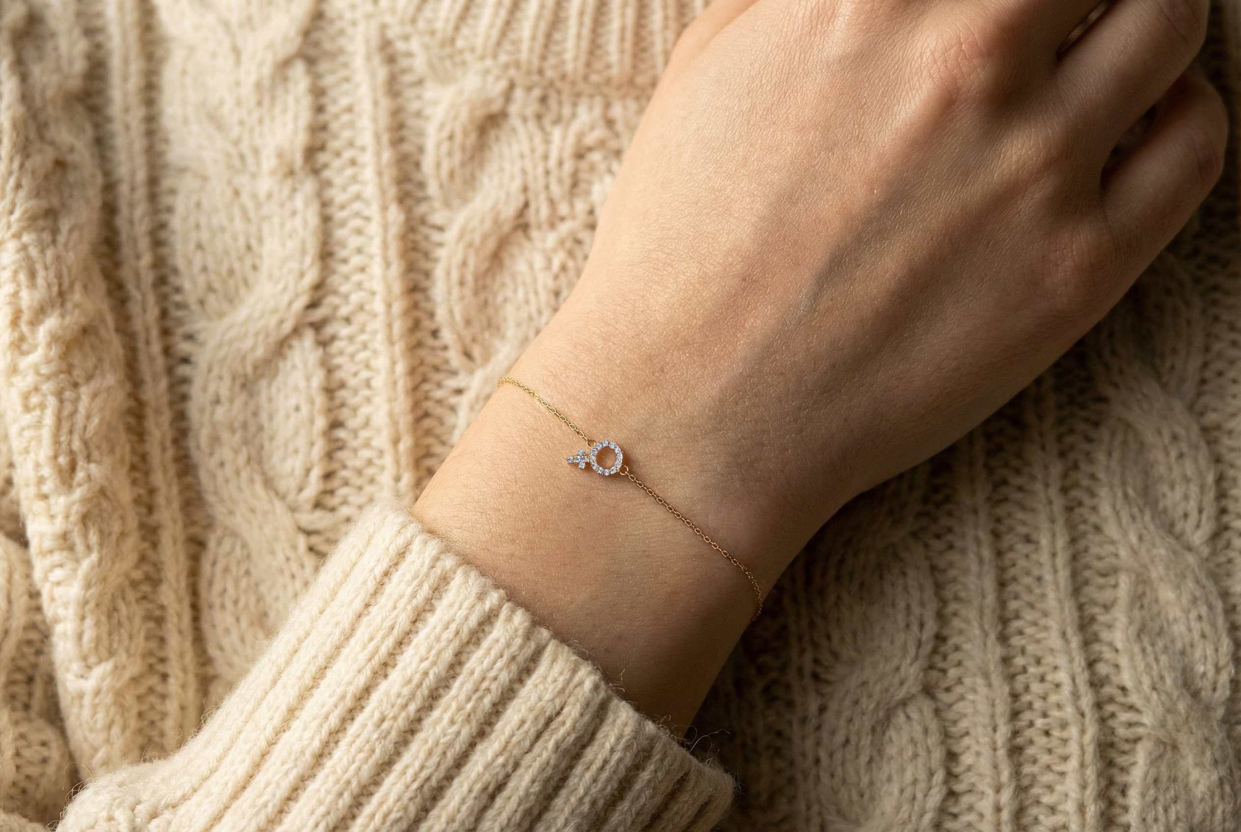 18K gold anchor chain bracelet with zirconia female symbol on model, real gold women's jewelry