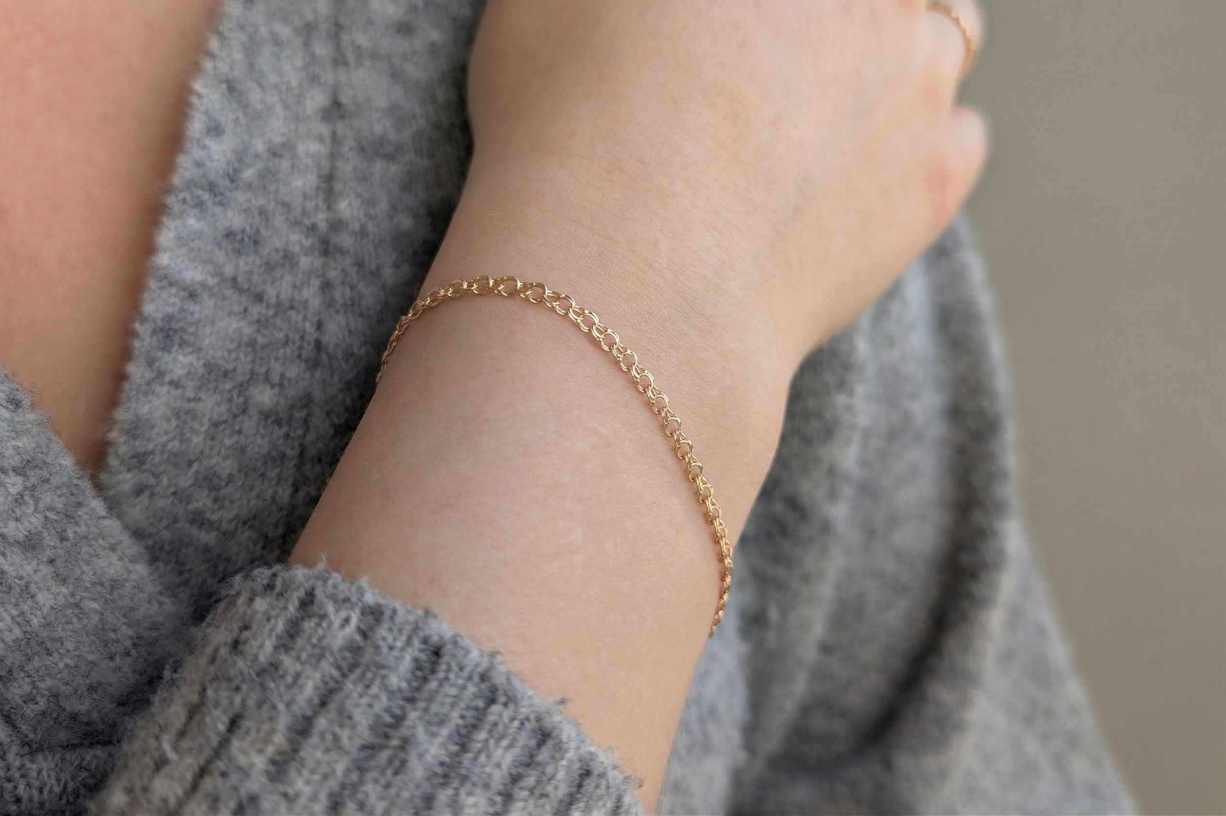 18K gold bismarck chain bracelet on model, real gold women's jewelry