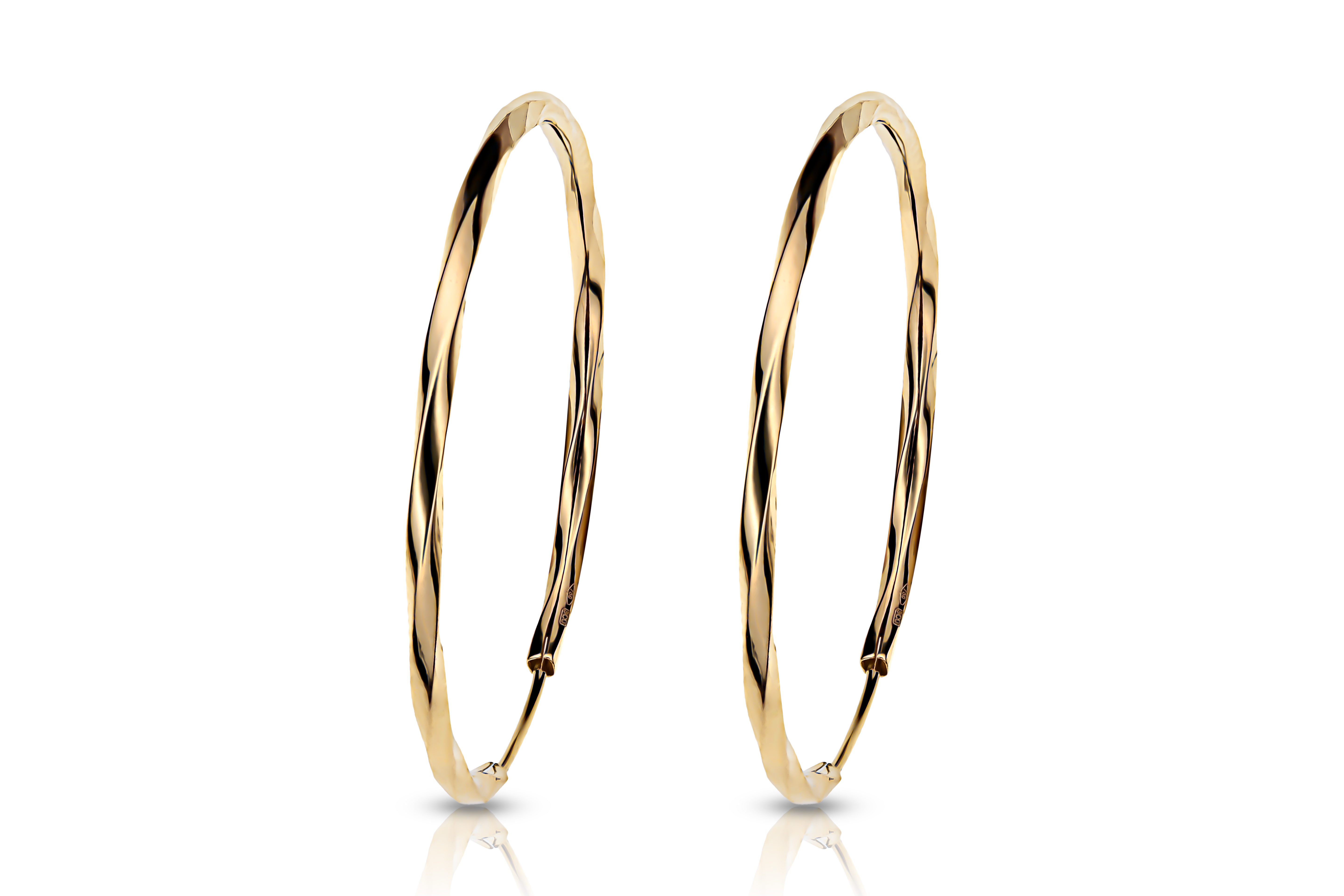 Guldörhängen creoler vridna facetterade 18k