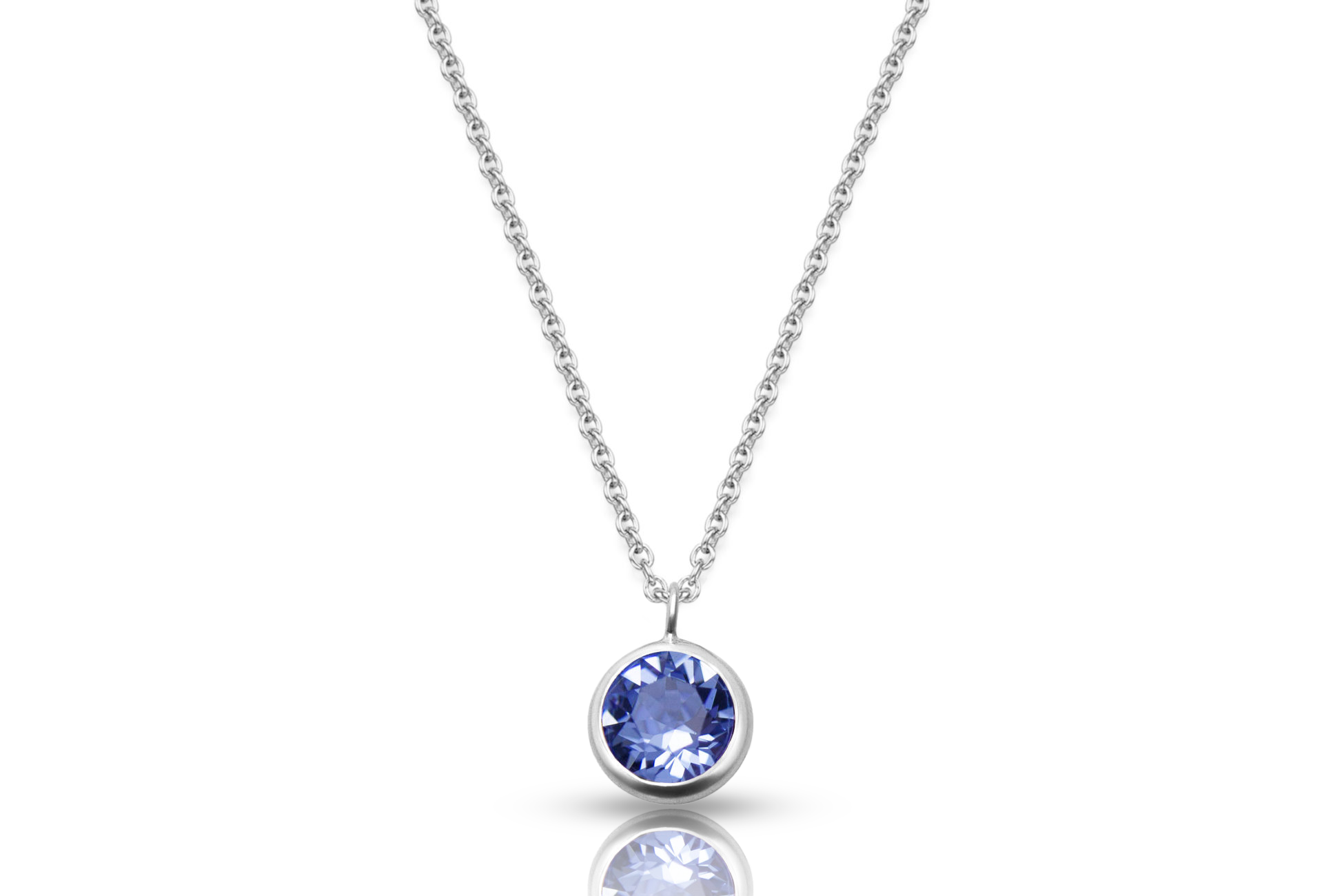 Silver necklace with anchor chain and blue zirconia pendant, close-up real silver women's jewelry